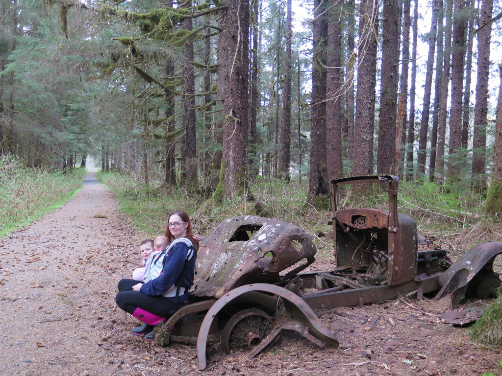 Old car on walking path in Juneau Alaska