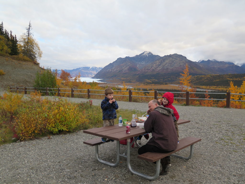 Eating a picnic lunch over close to a glacier